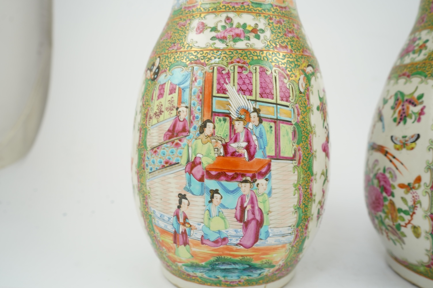 A pair of Chinese famille rose baluster vases, 19th century